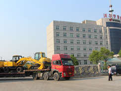 沃爾華集團(tuán)10臺挖掘機順利出口秘魯
